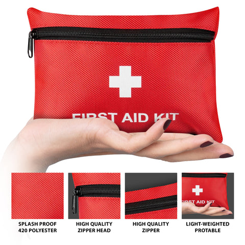 Compact red First Aid Kit bag held in hand showing splash-proof polyester material, durable zipper, and portable lightweight design for travel and emergency use.