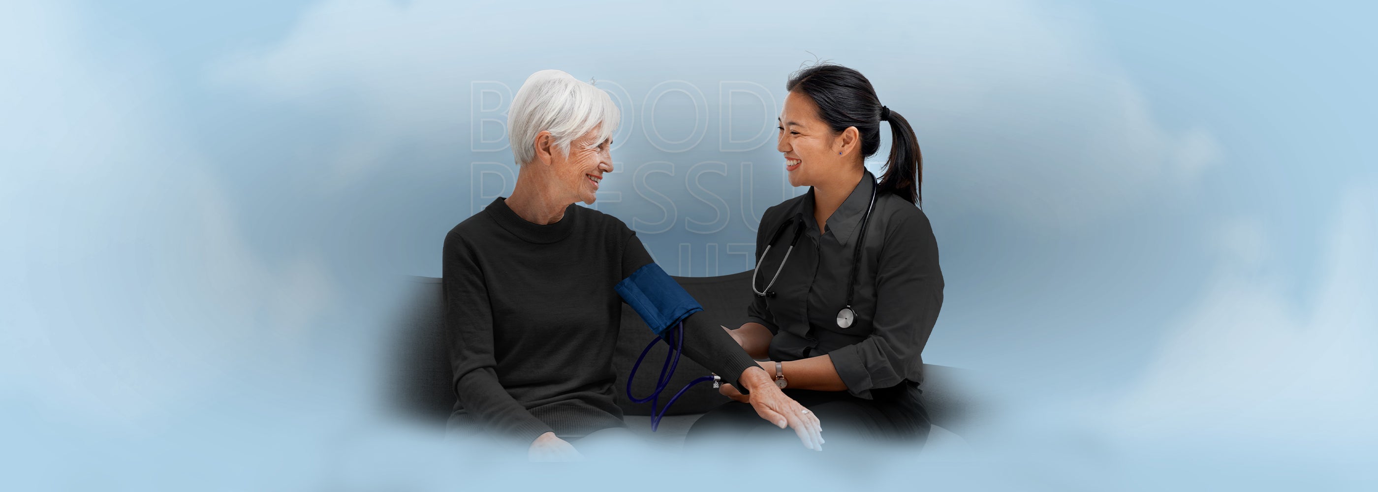 Nurse using a manual blood pressure monitor cuff and stethoscope to check an elderly patient's vitals. Represents professional diagnostic tools and home healthcare equipment.