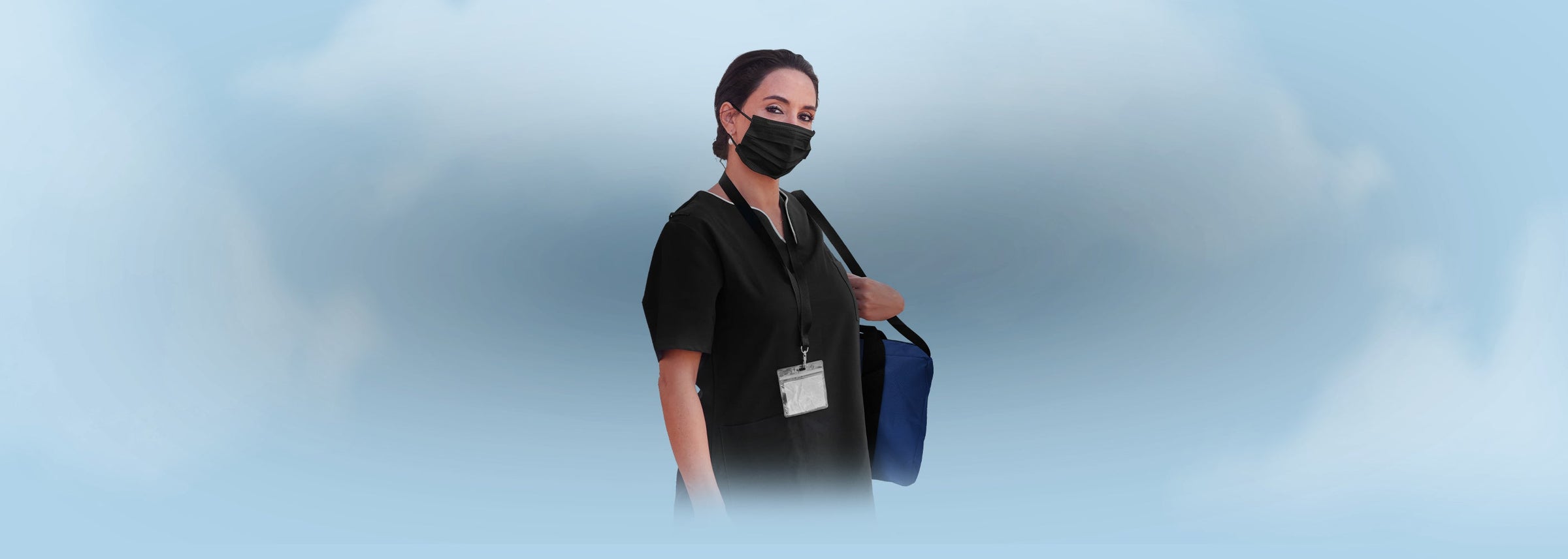 A female nurse wearing a black scrub and a face mask, carrying a blue medical bag, representing the Nurse Bags, Fanny Packs & Pocket Organizers collection.