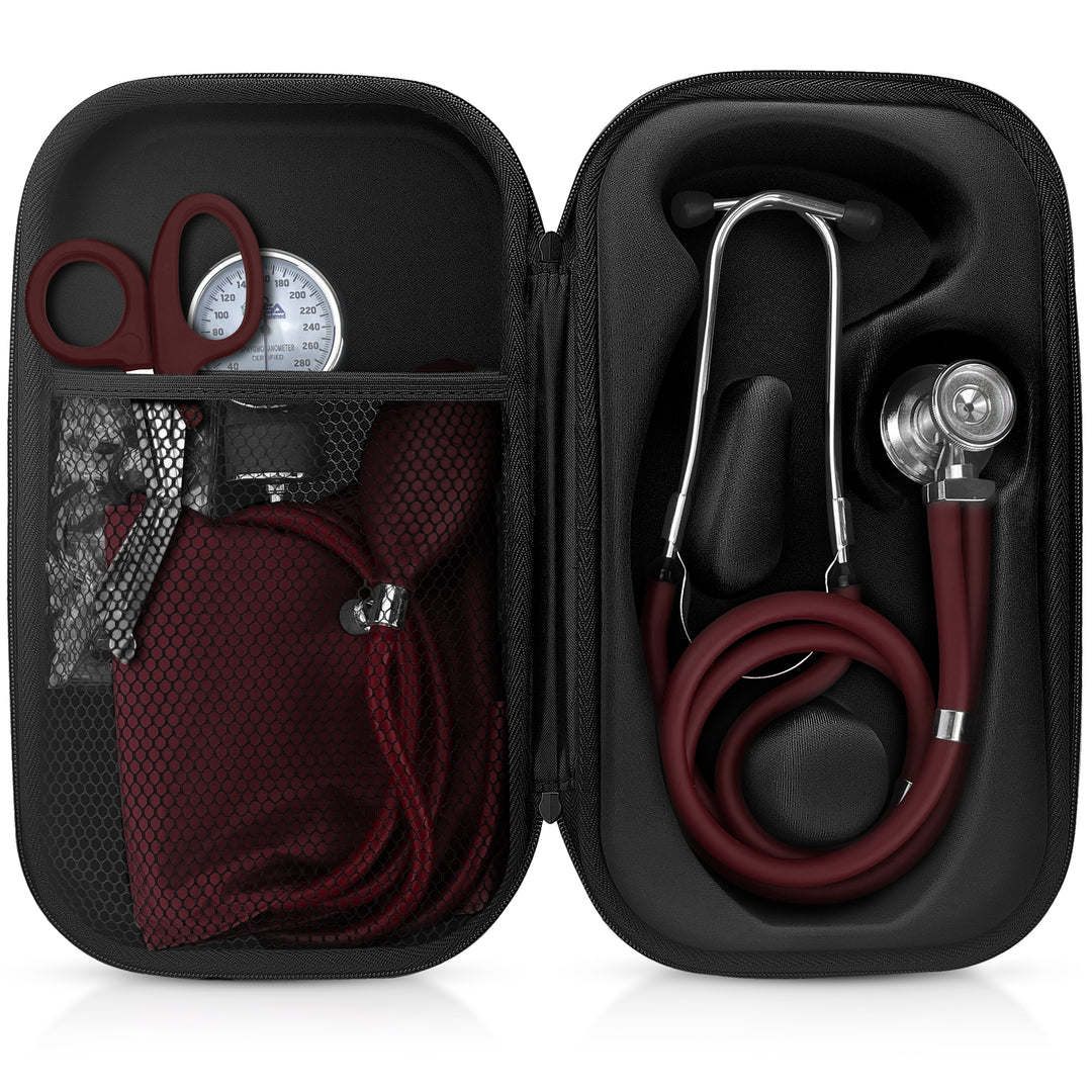 Open black hard-shell medical case displaying a burgundy kit. Left side holds burgundy trauma shears and a BP cuff in a mesh pocket; right side holds a burgundy Sprague Rappaport stethoscope.