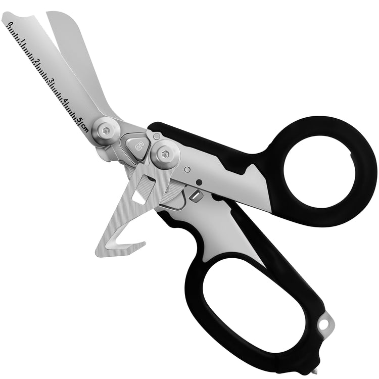 Unfolded Raptor Rescue Shears showing black handles, silver serrated blade, and strap cutter.