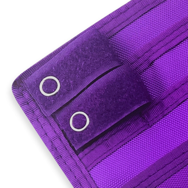 Close-up of a Purple fabric with grommets on a white background