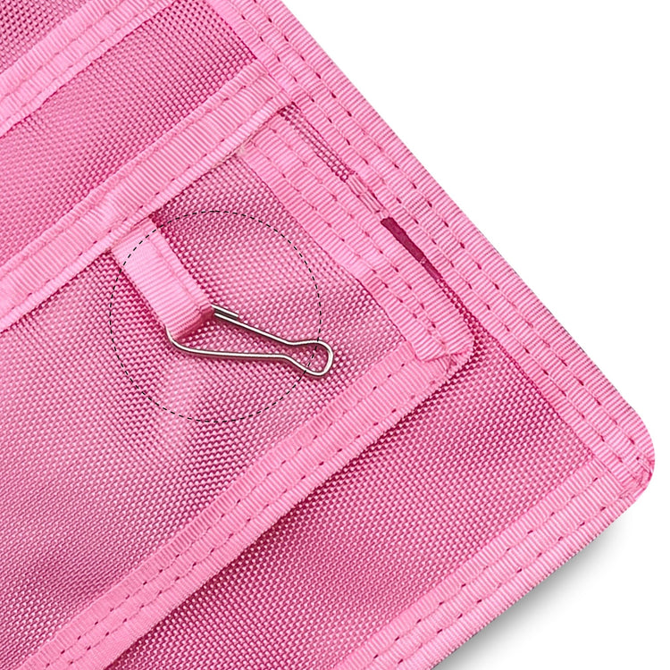 Close-up of a Light Pink fabric with a metal clip on a white background
