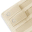 Close-up of a Off white fabric with grommets on a white background