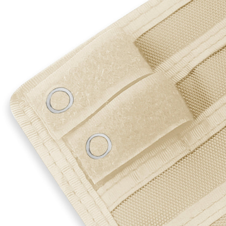 Close-up of a Off white fabric with grommets on a white background