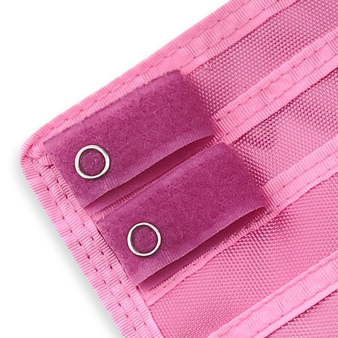 Close-up of a Light Pink fabric with grommets on a white background