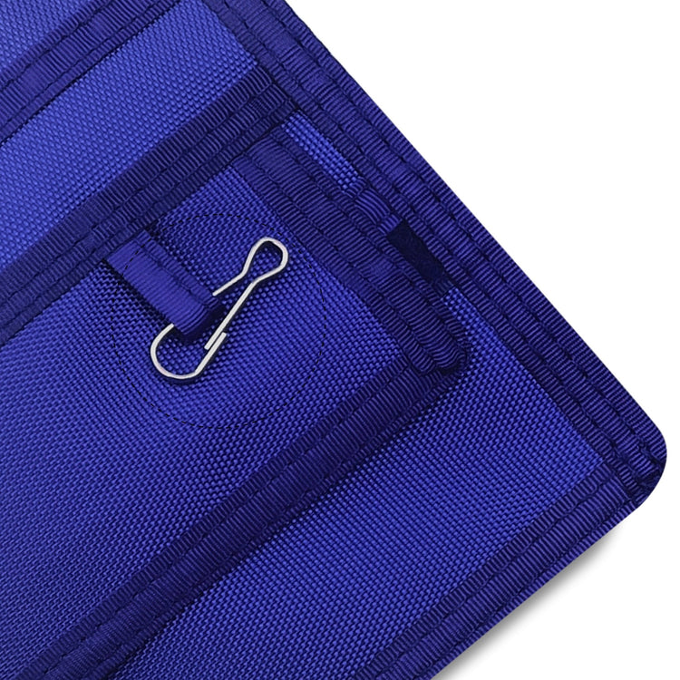 Close-up of a Blue fabric with a metal clip on a white background