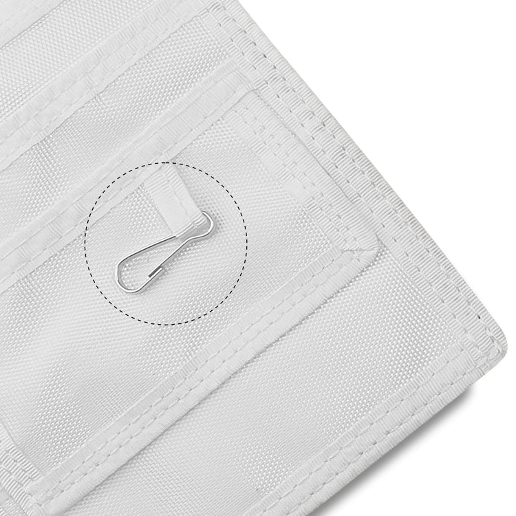 Close-up of a White fabric with a metal clip on a white background