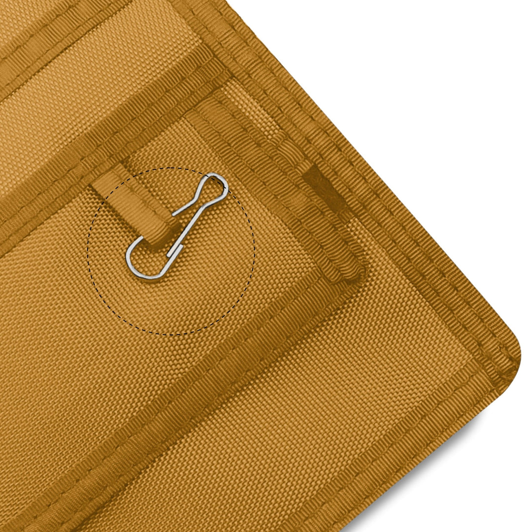 Close-up of a Yellow fabric with a metal clip on a white background