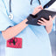 A nurse jotting down notes during her shift, with a sleek organizer pouch visibly tucked into her scrub pocket—ready with essential tools for quick access.