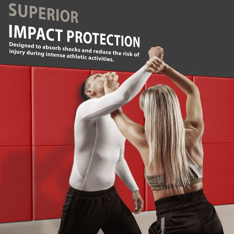 A man and woman practicing self-defense techniques against a wall lined with red pads, accompanied by text reading "SUPERIOR IMPACT PROTECTION" designed to reduce injury risk.
