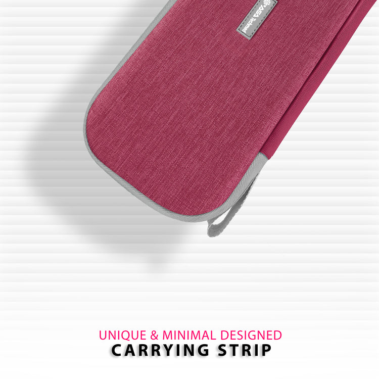 A close-up graphic of the corner of the pink hard-shell case with gray trim, focusing on the "unique and minimal designed carrying strip" attached to the zipper area.
