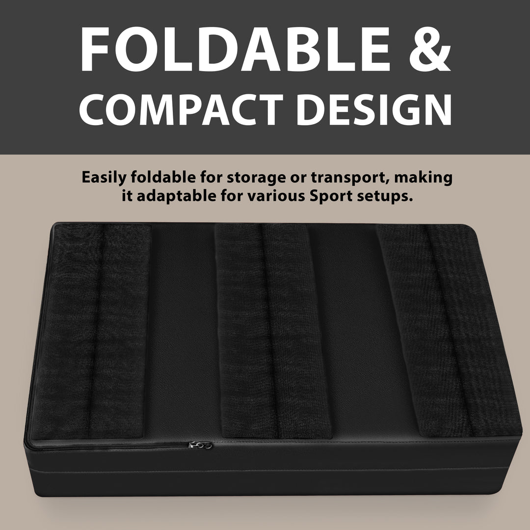 A black wall pad shown folded flat on the ground, displaying the back side with three wide black hook-and-loop strips for mounting, with text highlighting the "FOLDABLE & COMPACT DESIGN".