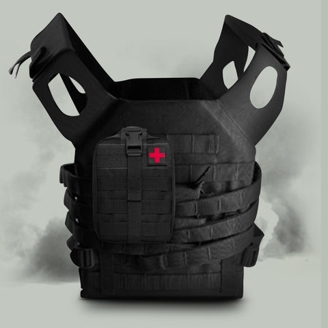 Black tactical vest with a red cross patch molle pouch on a light gray background
