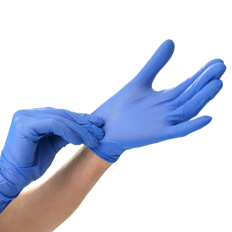 A pair of hands demonstrating the process of putting on blue disposable nitrile medical gloves against a white background.