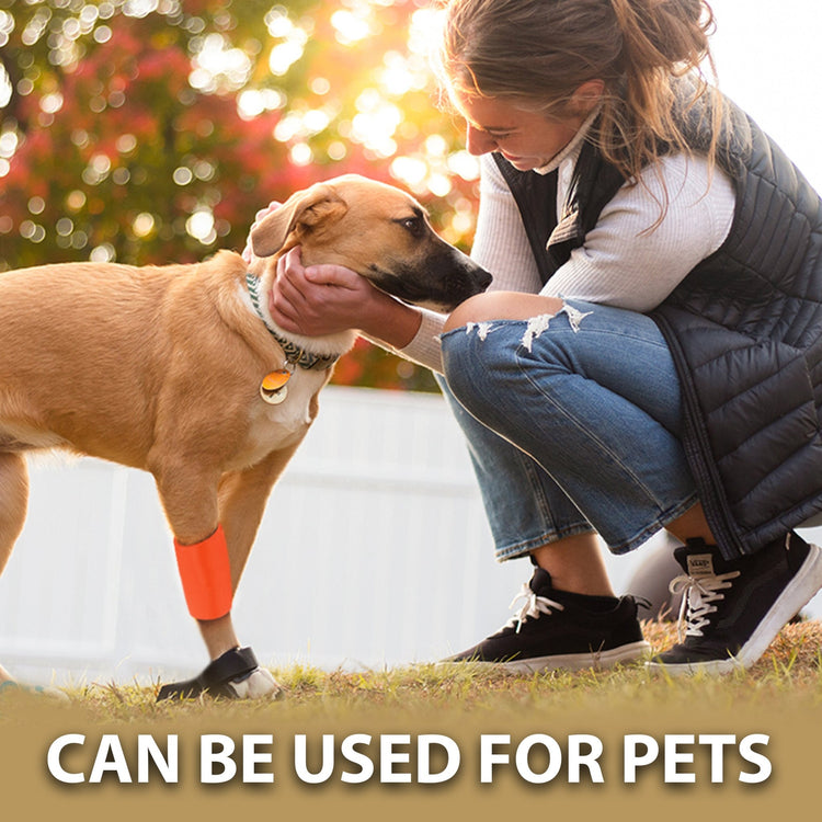 A woman is kneeling outside next to a dog, applying an orange splint to the dog's lower front leg. Text overlay reads: CAN BE USED FOR PETS.