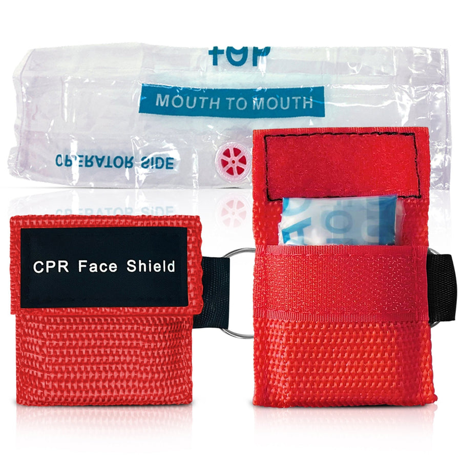 Detail view of the disposable CPR face shield. The top shows the unfolded clear plastic barrier with "Mouth to Mouth" and "Operator Side" printed on it with a central filter valve. The bottom shows the red velcro pouch open with the shield folded compactly inside.