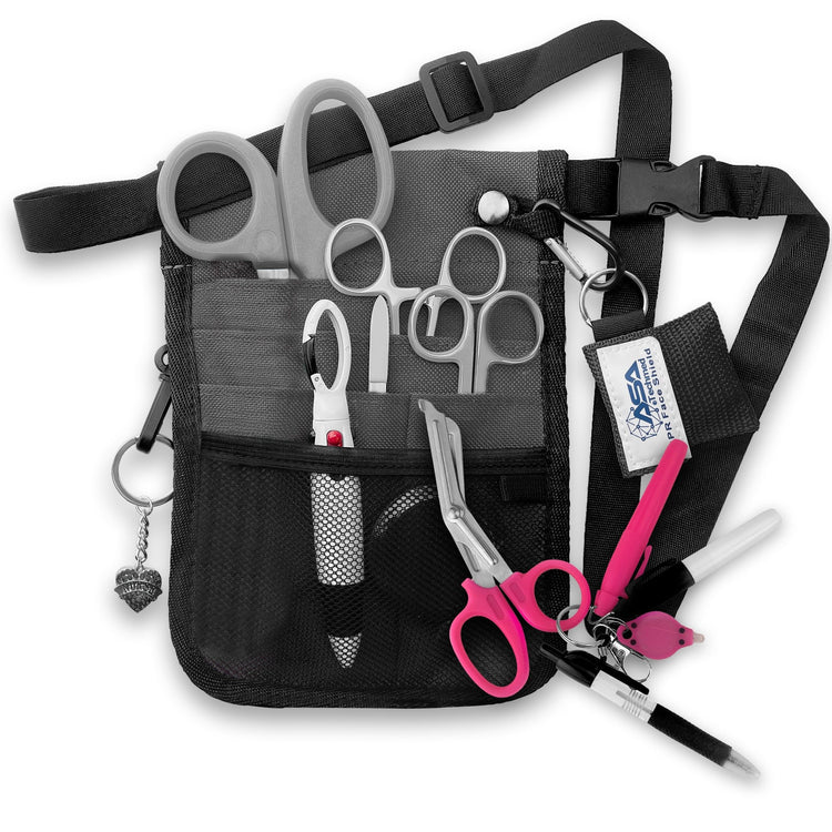 A fully assembled gray nursing organizer pouch attached to a black adjustable waist strap. The pouch is filled with medical supplies, including gray-handled trauma shears, hemostats, a CPR face shield keychain, a retractable tape measure, and various writing instruments. A decorative gray heart charm hangs from the side.