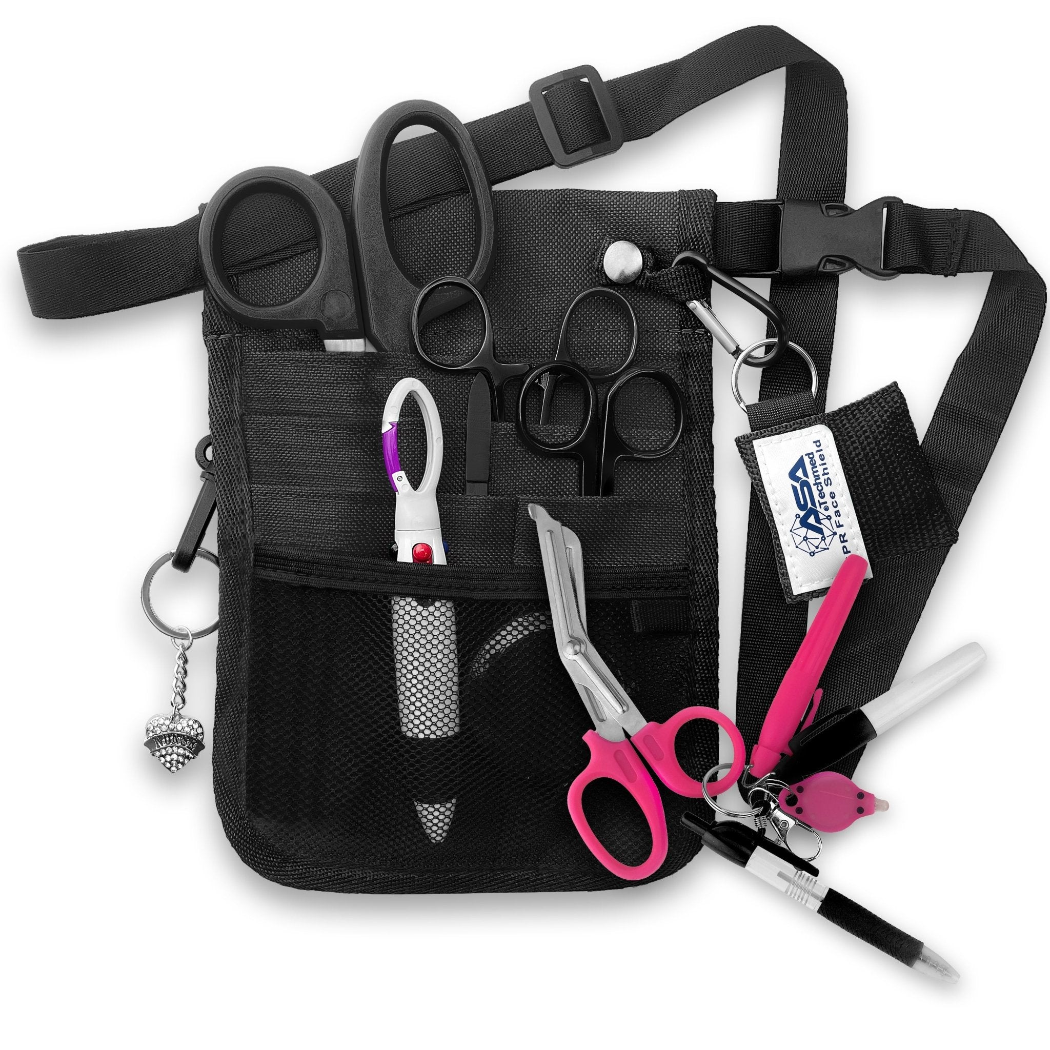 A fully assembled black nursing organizer pouch attached to a black adjustable waist strap. The pouch is filled with medical supplies, including black-handled trauma shears, hemostats, a CPR face shield keychain, a retractable tape measure, and various writing instruments. A decorative black heart charm hangs from the side.