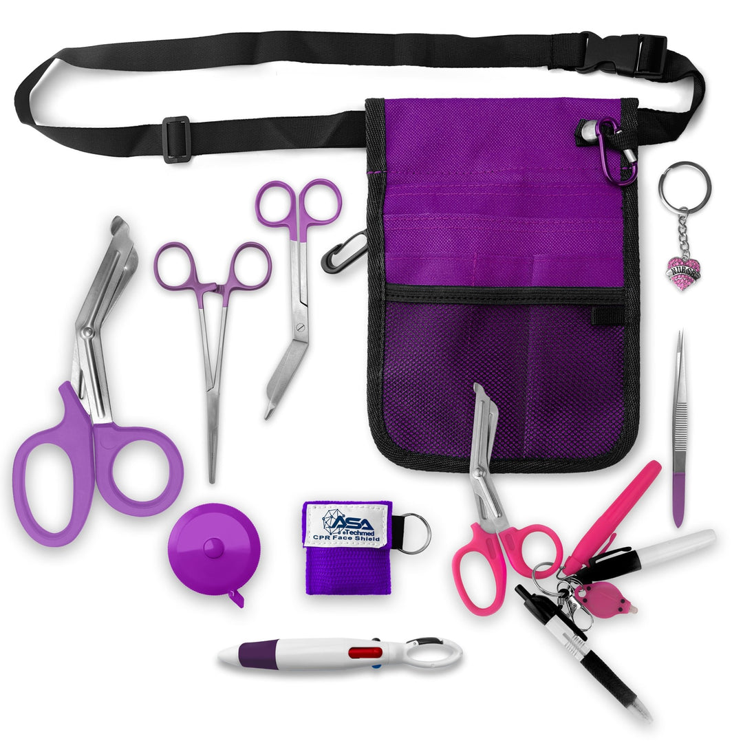 A top-down view displaying all items included in the kit laid out separately: the purple organizer pouch, adjustable black belt, large purple trauma shears, smaller bandage scissors, straight hemostats, purple tape measure, CPR face shield keychain, tweezers, a 4-color carabiner pen, permanent markers, and a rhinestone heart charm.