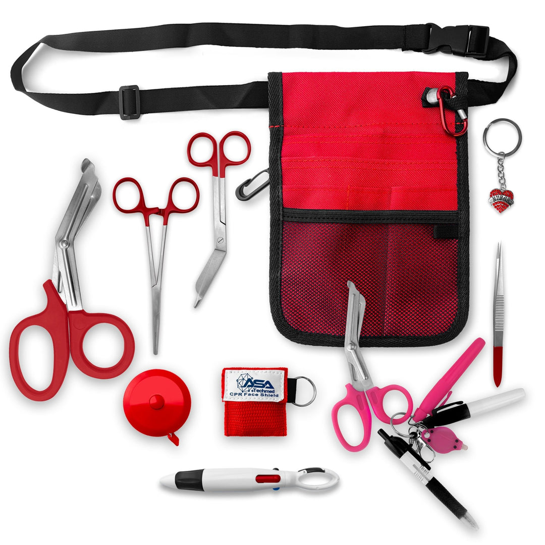 A top-down view displaying all items included in the kit laid out separately: the red organizer pouch, adjustable black belt, large red trauma shears, smaller bandage scissors, straight hemostats, red tape measure, CPR face shield keychain, tweezers, a 4-color carabiner pen, permanent markers, and a rhinestone heart charm.