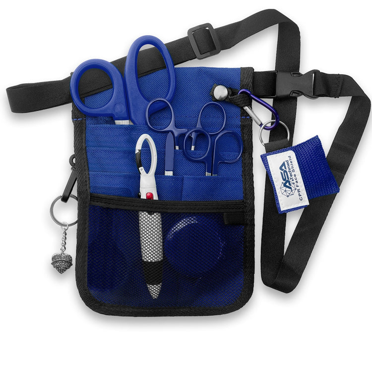 The blue nurse organizer shown fully packed with all the included tools. The shears, scissors, and hemostats are tucked into the slip pockets, while the tape measure and pens sit in the mesh pocket. The CPR face shield and heart charm are clipped to the exterior rings, demonstrating how the kit looks when ready for use.