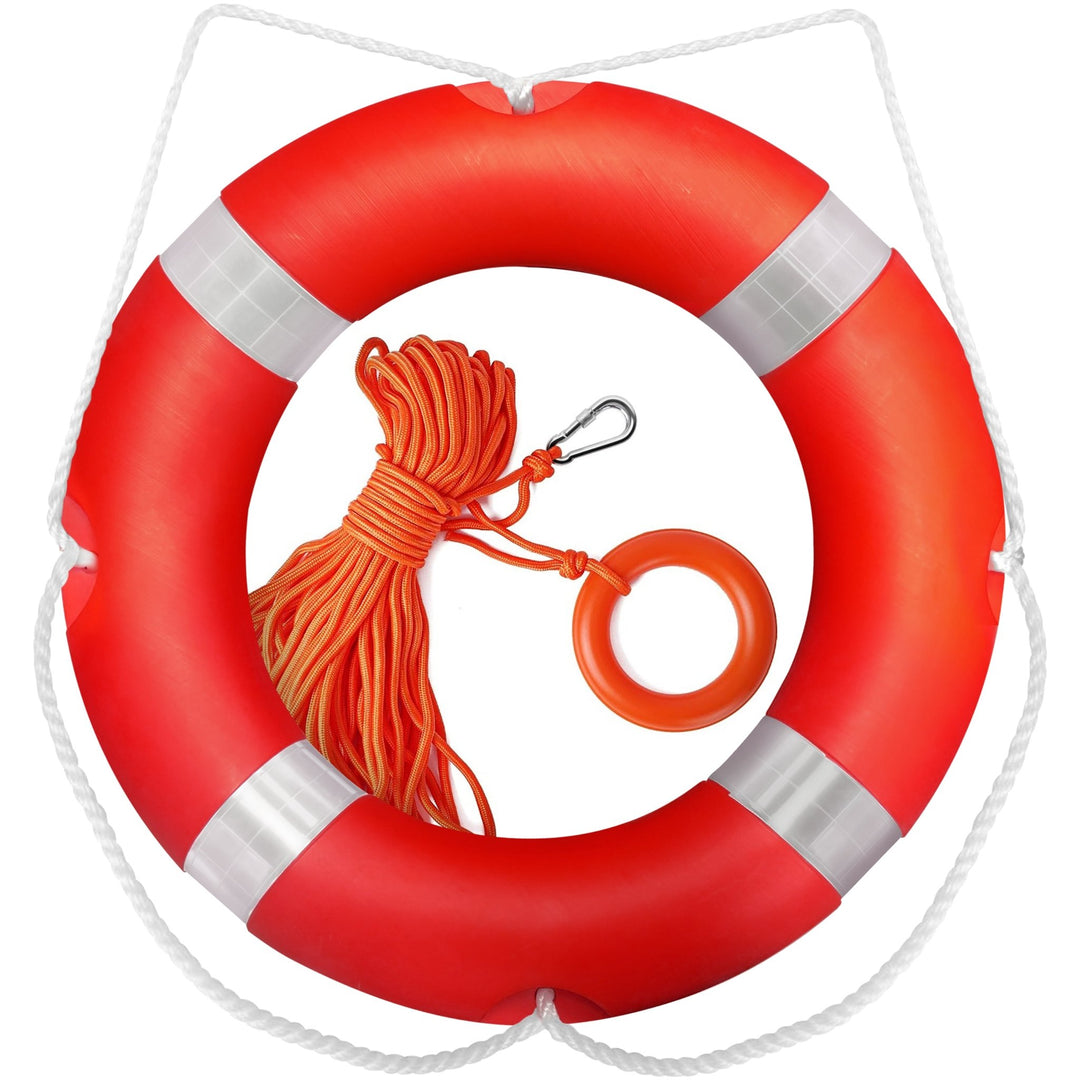 An orange circular life ring on a white background featuring four reflective silver bands and a white grab-rope around the perimeter. In the center sits a coiled orange floating safety rope equipped with a silver carabiner clip and a small orange hand-grip ring.