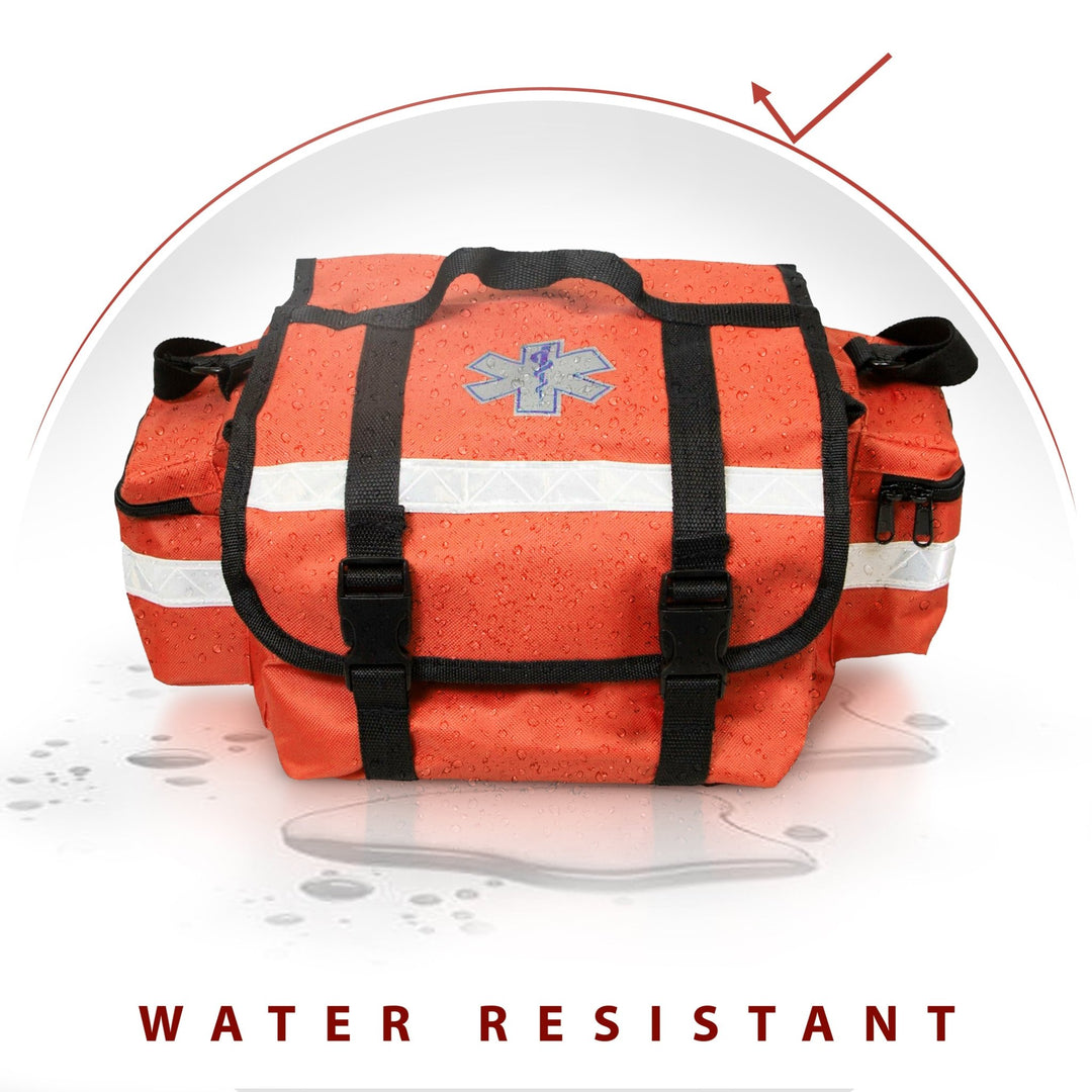 A orange medical bag shown with water droplets beading on its surface to demonstrate its durability. A graphic umbrella icon appears at the top, and the text "WATER RESISTANT" is displayed in bold at the bottom. The bag features a Star of Life symbol and black quick-release buckles.