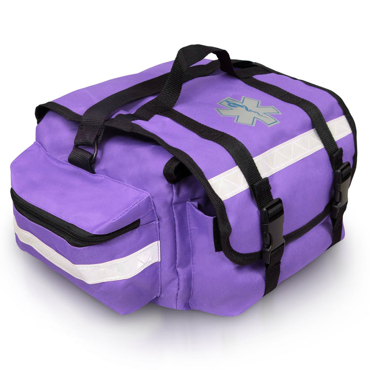 An angled side view of the purple first responder bag, highlighting one of the large zippered side pockets. The image details the silver reflective safety strip running across the pocket and the sturdy black webbing of the carrying handles.