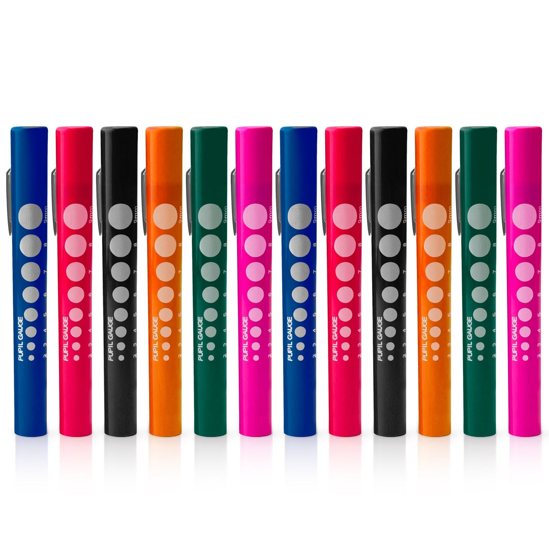 Twelve identical multicolor medical pen lights lined up in a row. Each pen features a silver metal pocket clip and a blue pupil gauge scale ranging from 2mm to 9mm printed on the side.