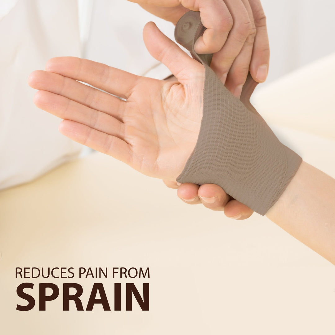 Person wrapping their hand and wrist with a beige bandage. Text reads: Reduces pain from sprain.