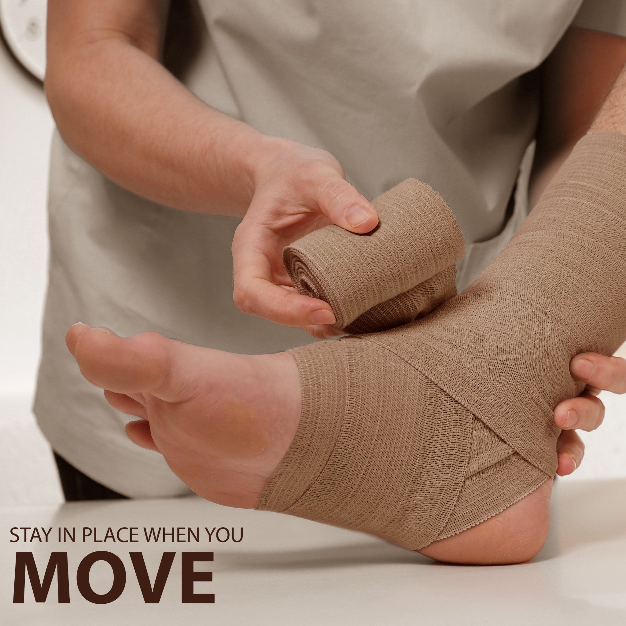 Hands applying a beige elastic bandage to a foot and ankle. Text reads: Stay in place when you move.