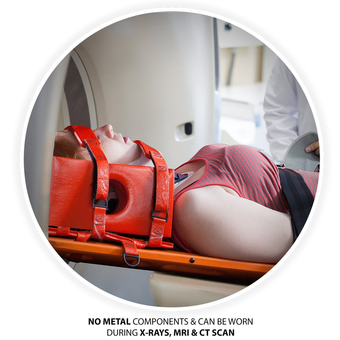 Patient lying in a medical scanner wearing the red head immobilizer. Text reads: No Metal components & can be worn during X-Rays, MRI & CT Scan.