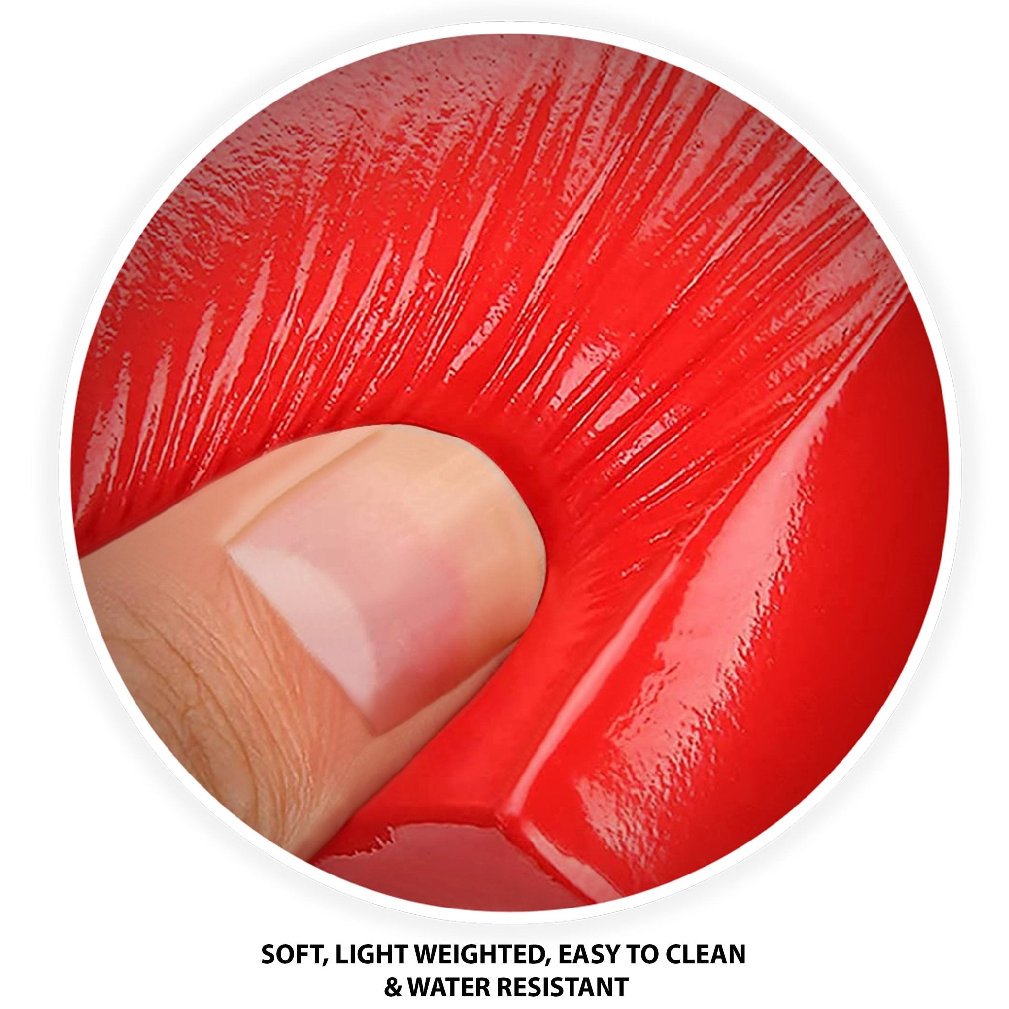 Macro shot of a finger pressing into the soft red vinyl surface of the head immobilizer. Text below reads: Soft, Light Weighted, Easy To Clean & Water Resistant.