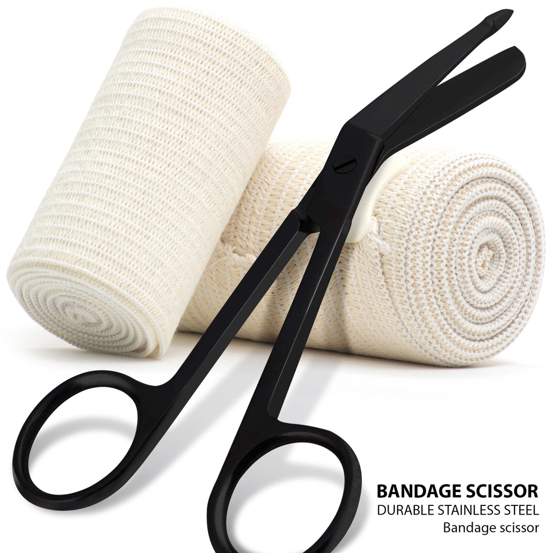 Black angled bandage scissors resting against two rolls of white elastic medical gauze.