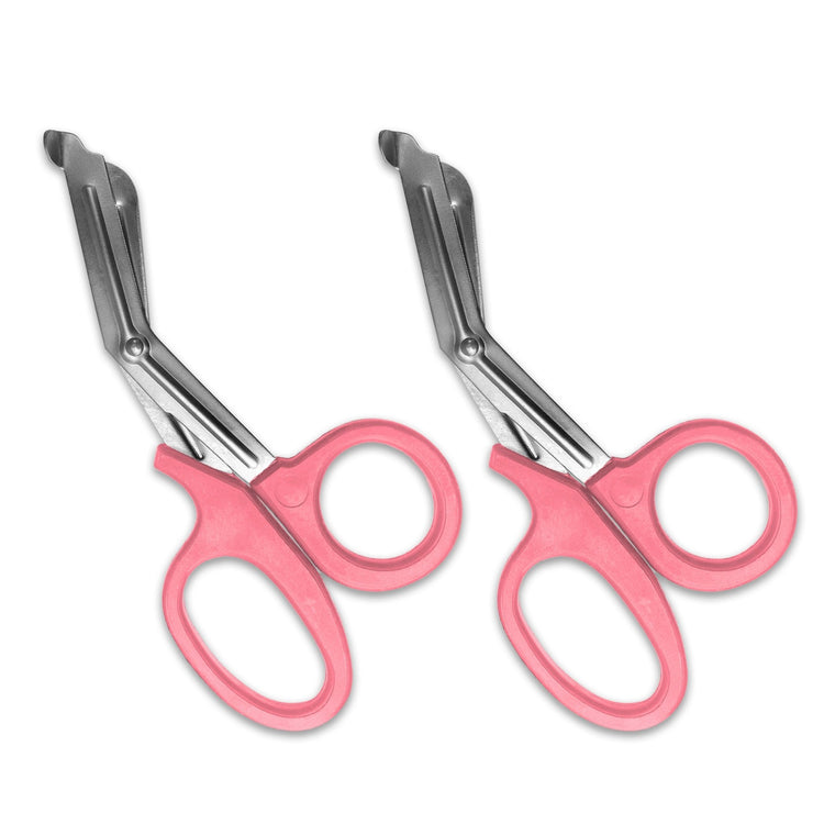 A pair of pink trauma shears against a white background. The shears are identical, with pink plastic handles and stainless steel blades.