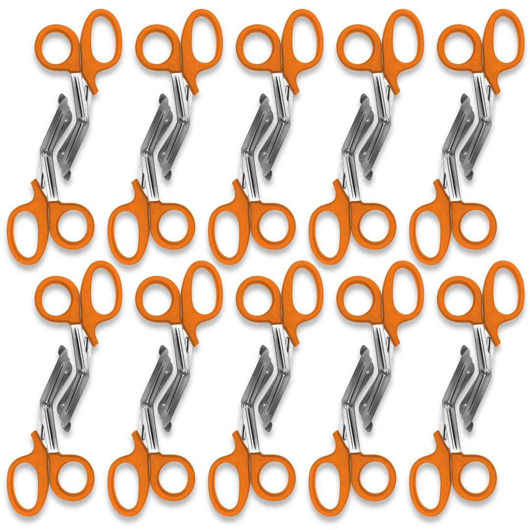 A pattern created by ten pairs of  orange trauma shears arranged in two rows against a white background. The shears are identical, with orange plastic handles and stainless steel blades.