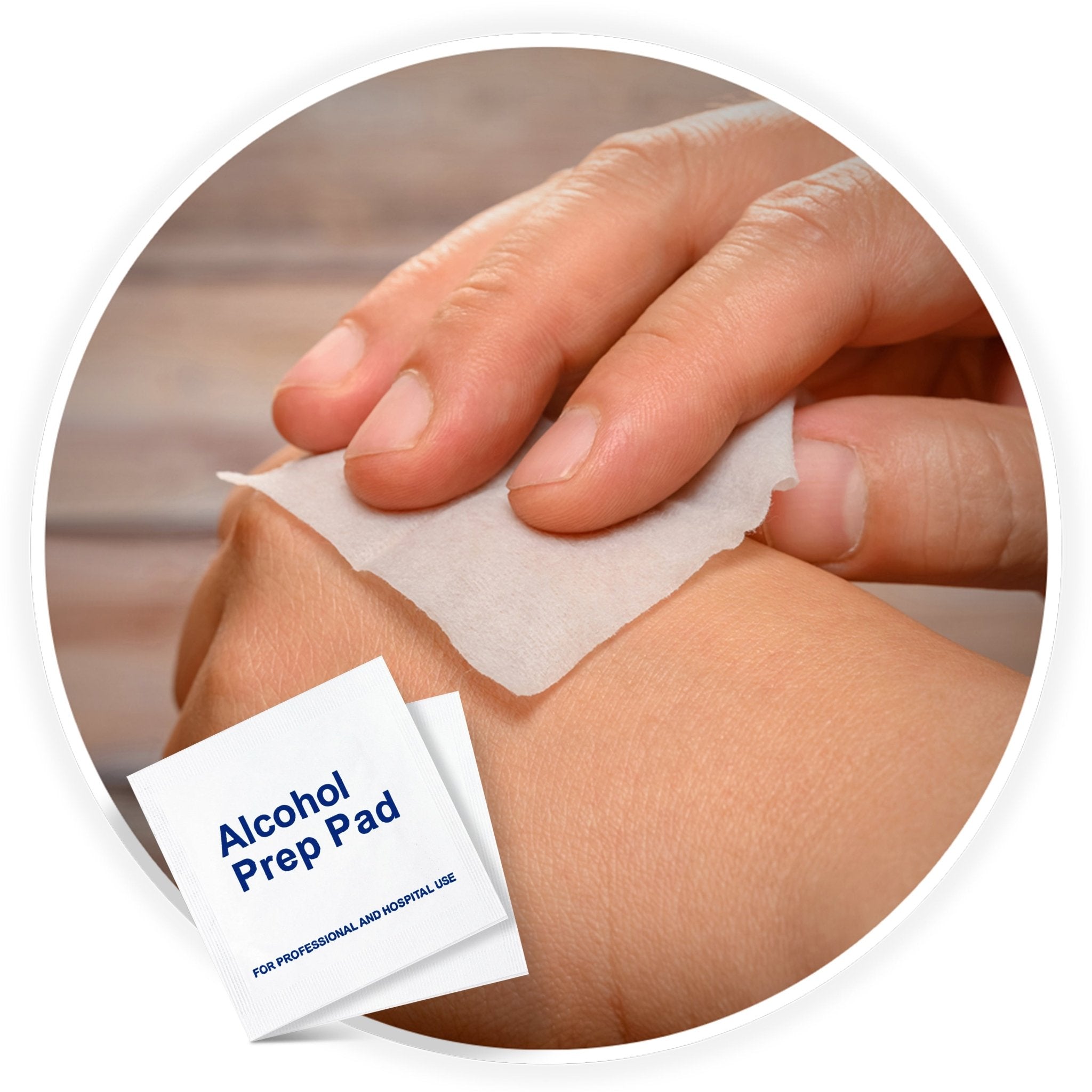 A close-up view of a hand using an alcohol prep pad to clean the skin on another hand, with a packet labeled "Alcohol Prep Pad" visible in the foreground.