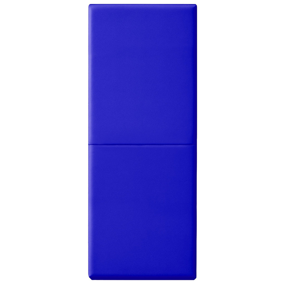 A vertical studio shot of a blue safety wall pad fully extended, showing the smooth vinyl texture and the horizontal crease in the center where the mat folds.