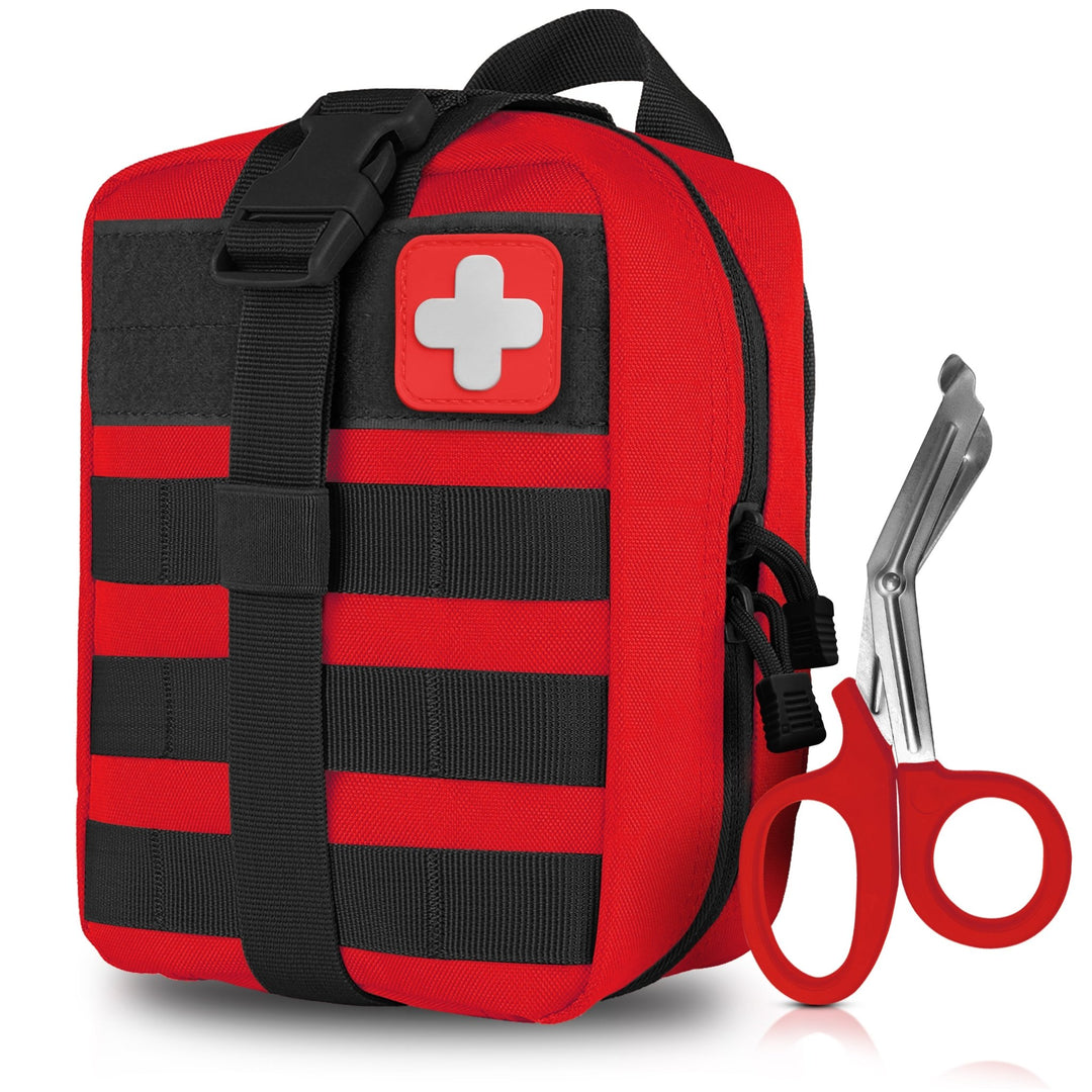 A product shot of a red tactical first aid pouch featuring front Molle webbing and a red cross patch, standing next to a pair of red-handled trauma shears.