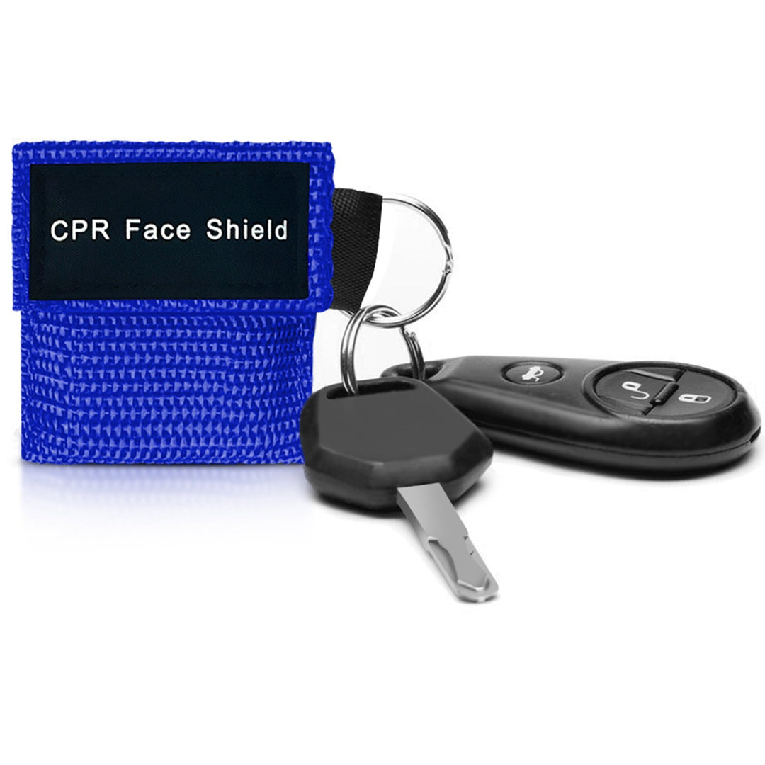 A close-up lifestyle shot of a blue CPR face shield pouch attached to a car key fob, demonstrating its portability and convenience for everyday carry on a keyring.