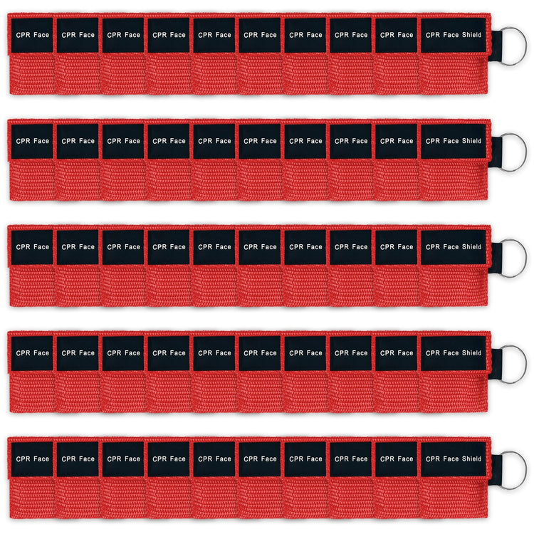 A bulk package display of fifty red CPR face shield keychains arranged neatly in five rows of ten, suitable for training or large groups.