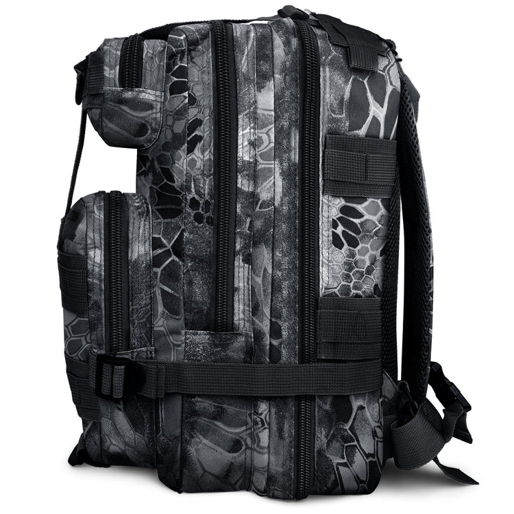 Side profile of the combat backpack highlighting its multiple zippered compartments and the compression strap system for space management.
