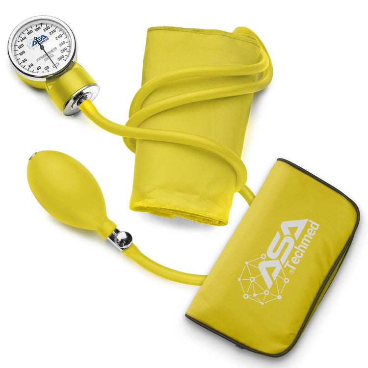 Flat lay of the yellow blood pressure monitor components: gauge, cuff, bulb, and case.