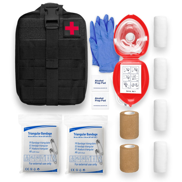 A flat-lay inventory of the emergency kit contents. It includes one black tactical pouch with a red cross, a pair of blue gloves, a red CPR mask case, two alcohol prep pads, two packaged triangular bandages, two rolls of tan self-adhesive wrap, and three rolls of white gauze bandage.