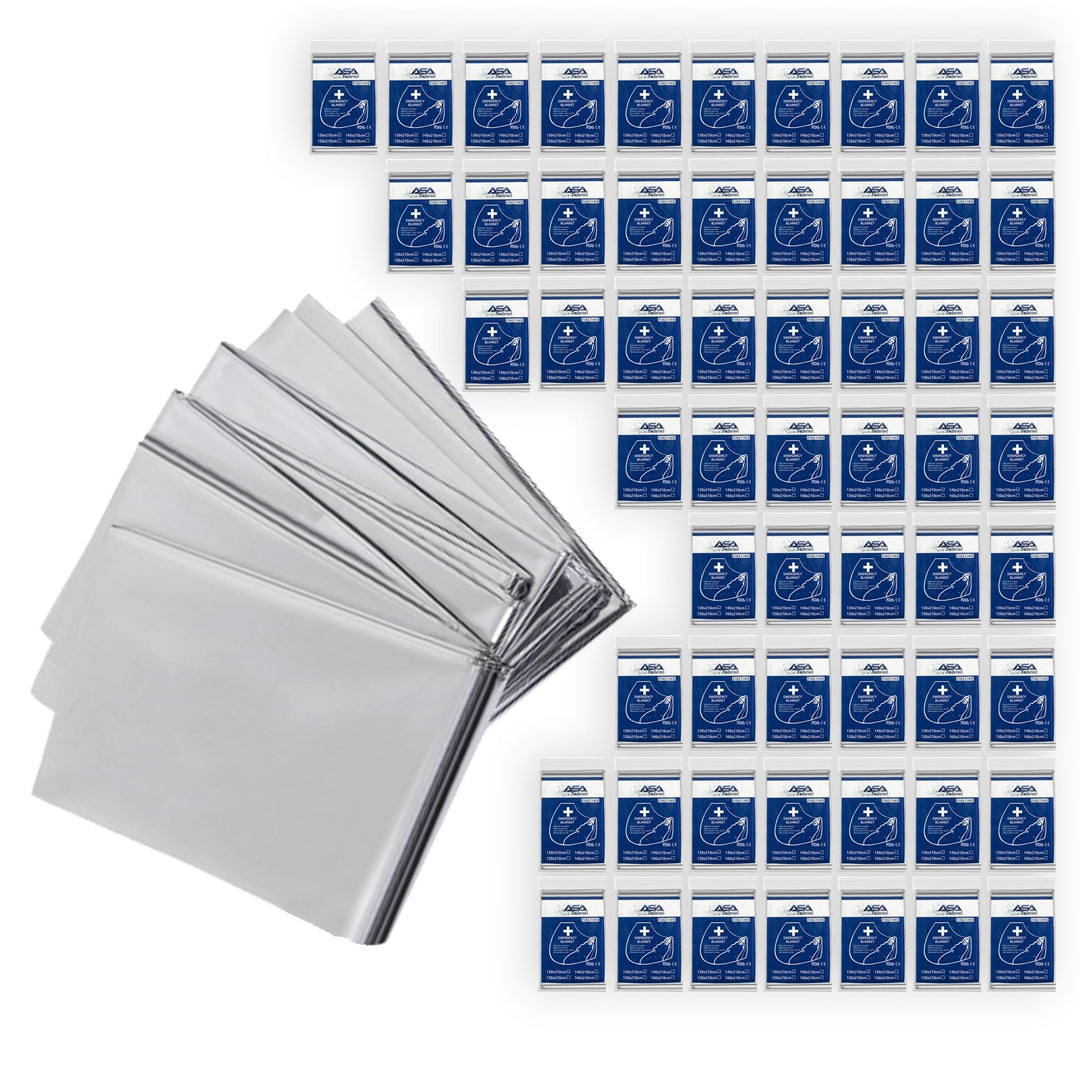 A product display for a bulk 50-pack of emergency blankets. A stack of folded silver blankets is shown on the left, alongside a large grid of fifty individually packaged units ready for distribution.