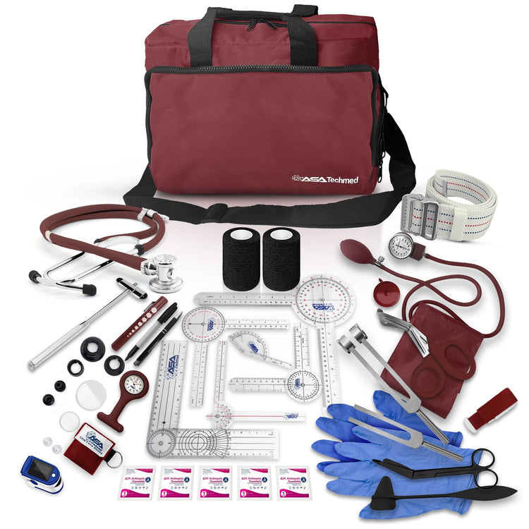 A large burgundy medical bag from ASA Techmed surrounded by its contents. Items include a stethoscope, blood pressure cuff, reflex hammers, goniometers, tuning forks, medical shears, penlights, a gait belt, medical gloves, a pulse oximeter, and antiseptic wipes.