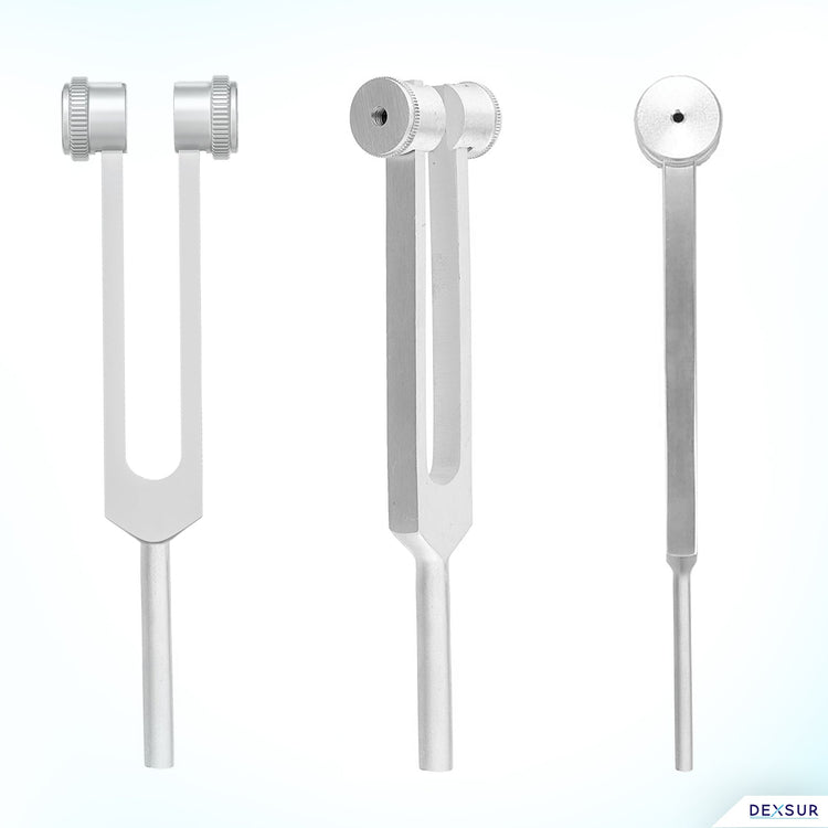 A product display showing three different views of a silver C128 tuning fork against a light blue gradient background. It shows a direct front view, a three-quarter angled view, and a side profile view to illustrate the tool's complete construction.