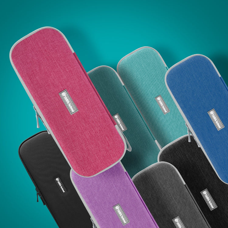 A colorful collection of hard-shell stethoscope carrying cases arranged together, featuring pink, teal, blue, black, purple, and grey options.