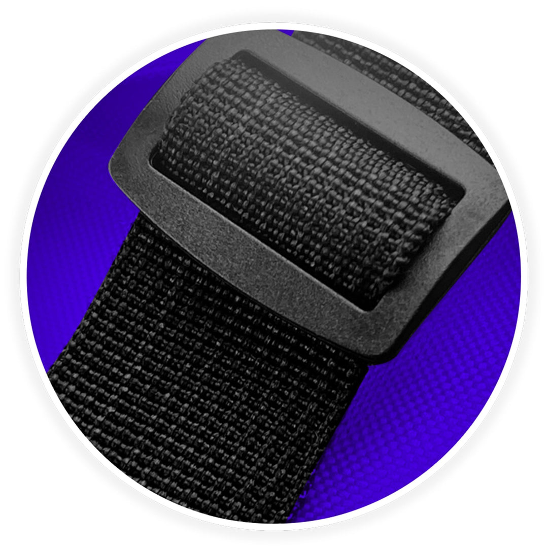 Macro shot of the reinforced plastic rectangular buckle connecting the sturdy black shoulder strap to the tote bag